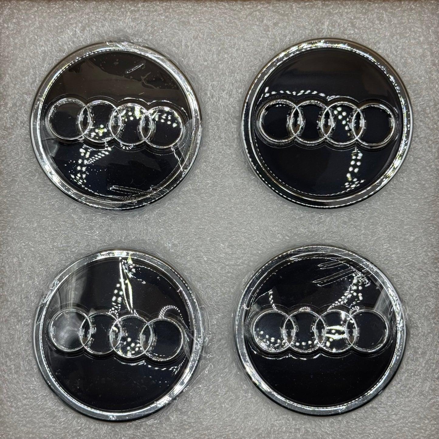 Audi Black & Chrome Floating Centre Caps 69mm - Set of 4