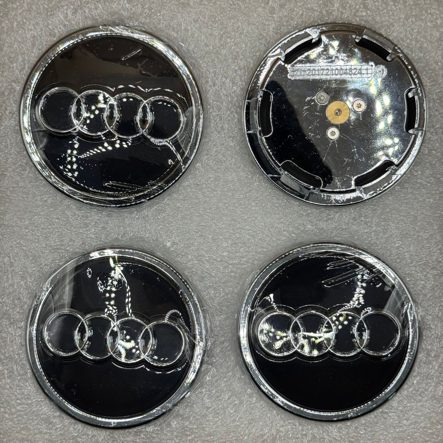 Audi Black & Chrome Floating Centre Caps 69mm - Set of 4