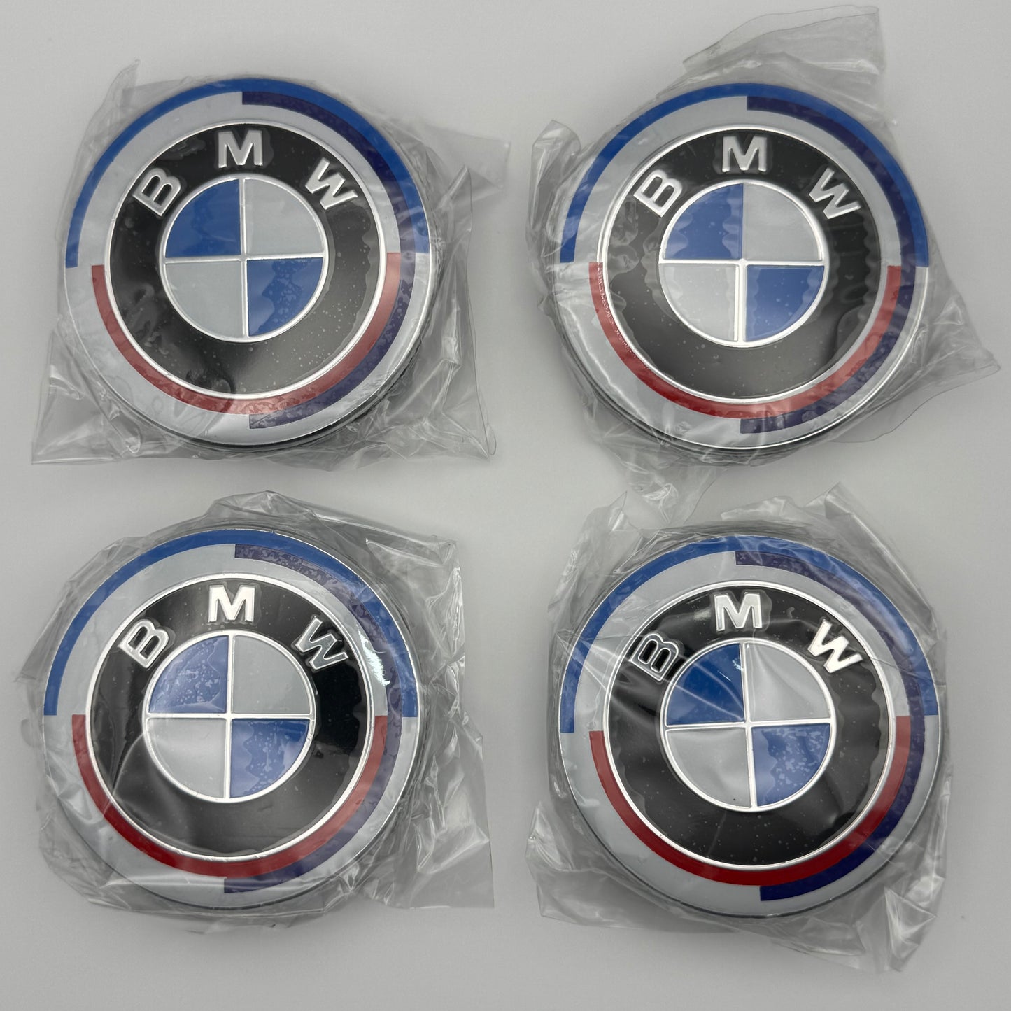 BMW 50th Anniversary Centre Caps 68mm - Set of 4