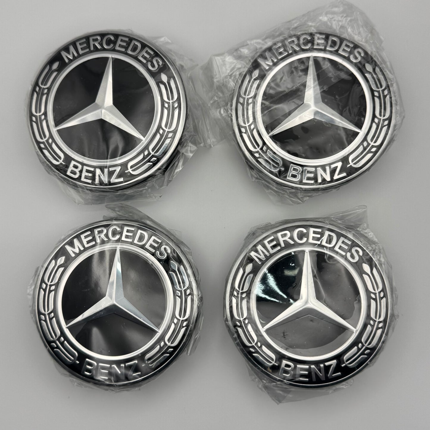 Mercedes-Benz Black & Chrome Centre Caps 75mm - Set of 4